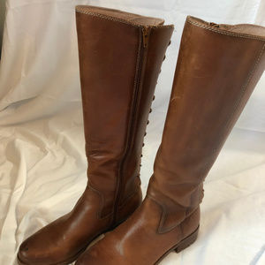 Tall brown riding boots